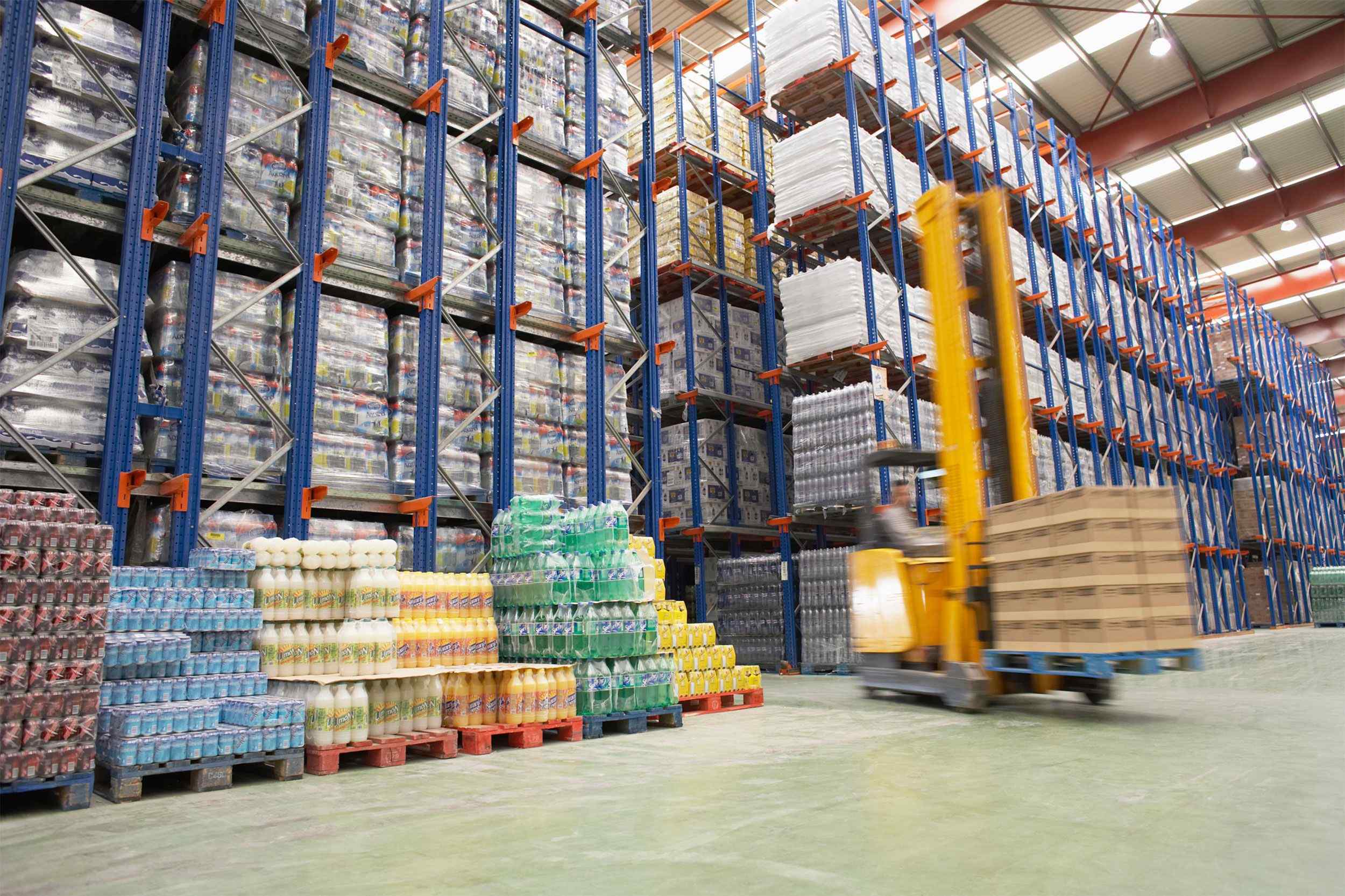 https://www.phoenixintlco.com/wp-content/uploads/2015/09/Warehouse-and-lifter.jpg